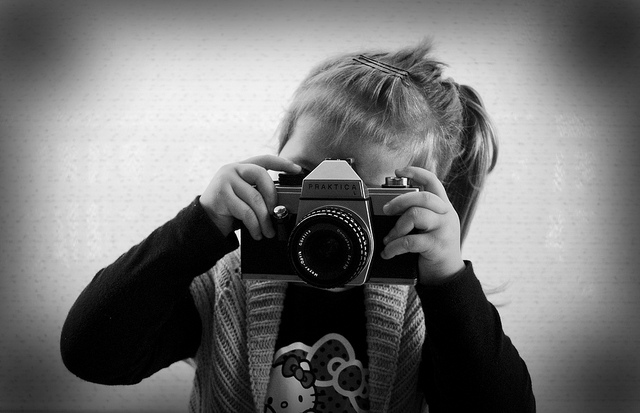 kid taking a photo